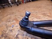 triangle avant droit inférieur 