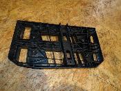 support grille pied avant gauche