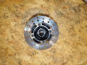 étoile de roue arrière gauche avec disque de frein