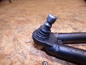 triangle avant gauche inférieur